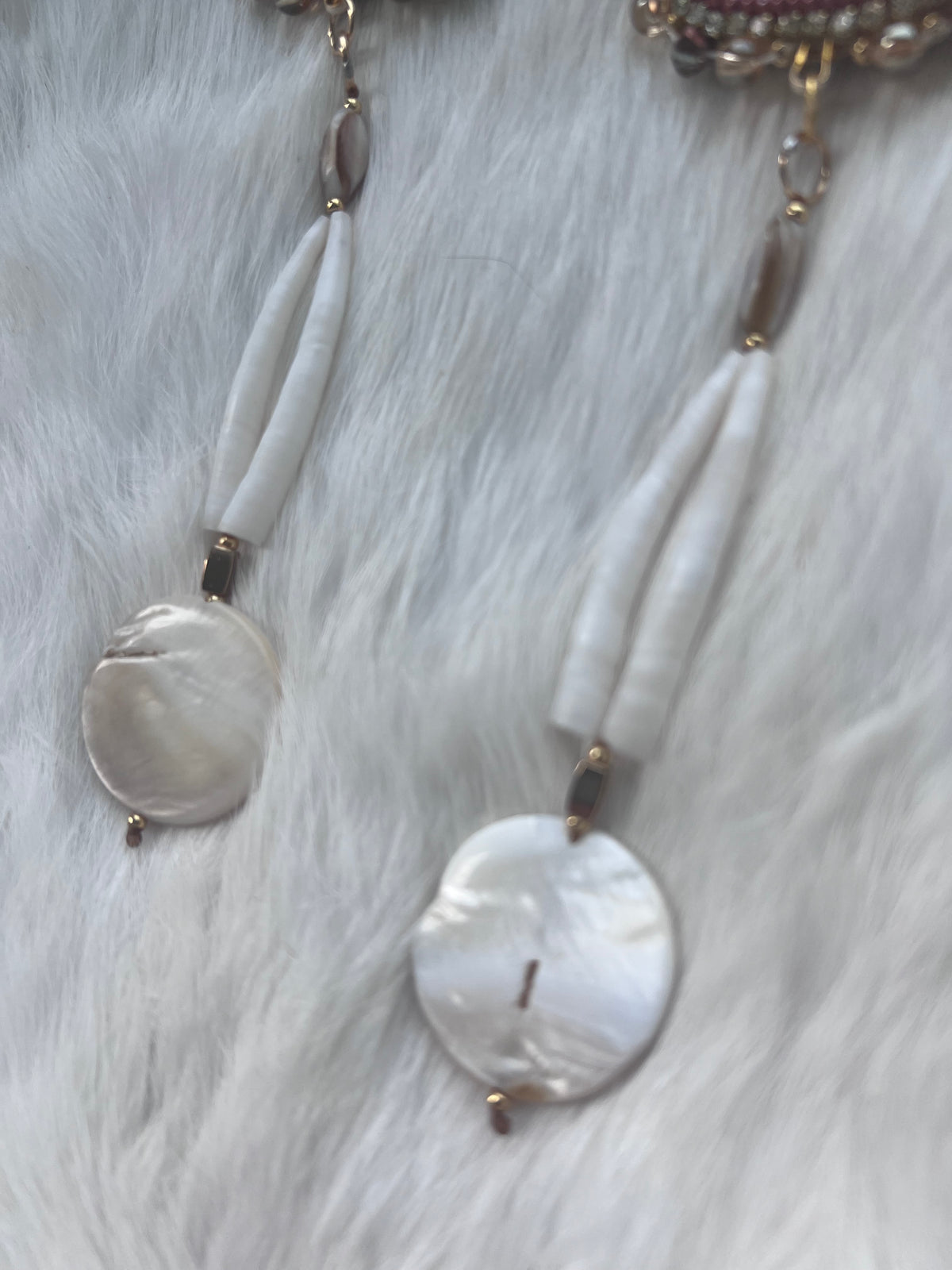 Dentalium drops with conquille shells