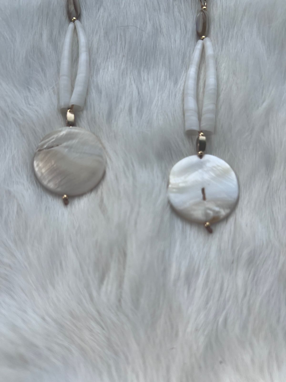 Dentalium drops with conquille shells